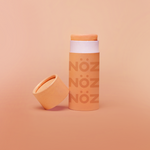 Load image into Gallery viewer, Nöz Vegan Tinted Chemical Sunscreen Stick in Orange
